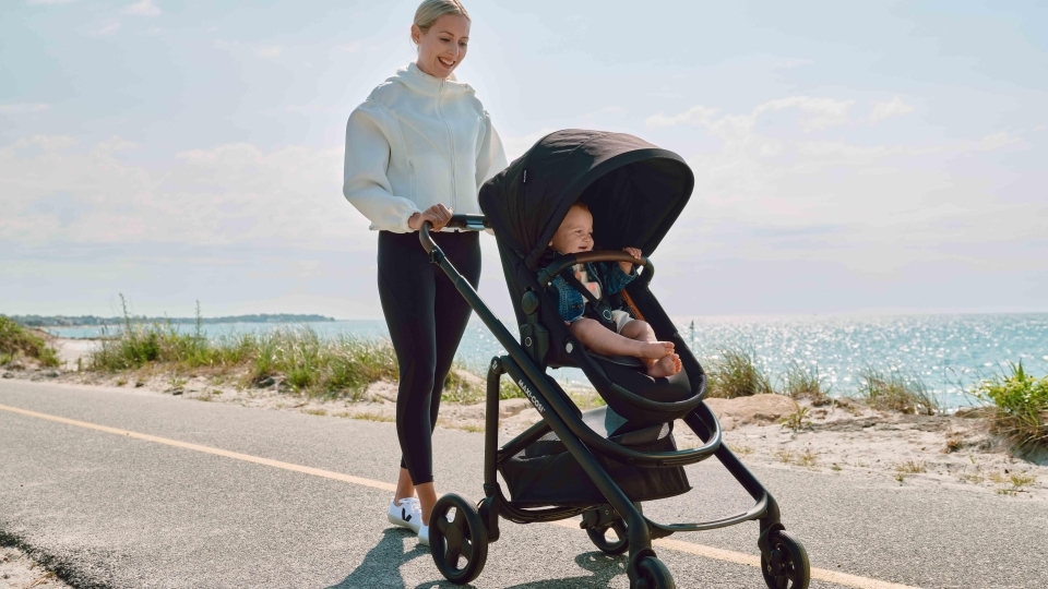 Parent pushing baby in Tayla stroller